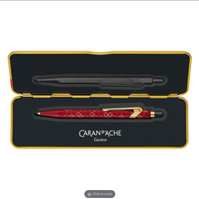 Load image into Gallery viewer, Caran D’Ache 849 Ballpoint Pen Dragon Red with Tin
