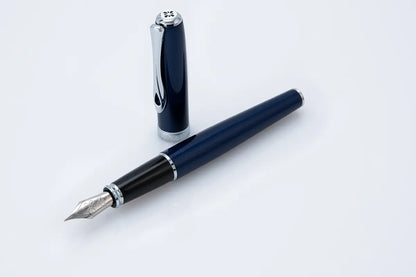 Blue fountain pen on a white background